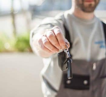 Shallow Focus Car Key held by a Man