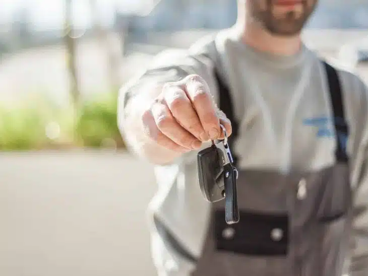 Shallow Focus Car Key held by a Man