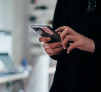 person holding black android smartphone