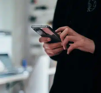 person holding black android smartphone